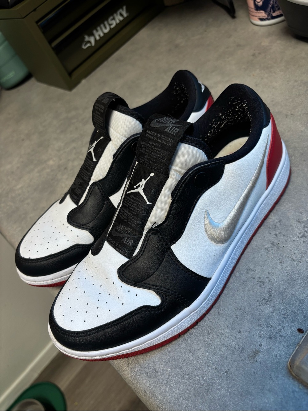 Nike Jordan 1 Low Top Sneakers - White/Black/Red with Silver Swoosh